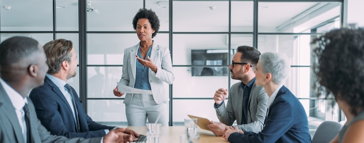 People talking in an office conference room
